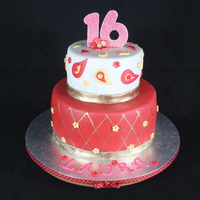 Sweet Sixteen Birthday Cake 2-tier Eastern Indian inspired cake in a red/gold color theme.