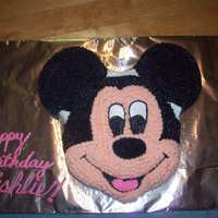 Mickey Mouse All buttercream, made with a Mickey Mouse pan. I made this cake for my friend's daughter who turned 12 (but thinks she's 21). We...