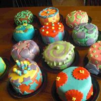 Cakes In A Row To "force' myself to do a fondant cake, I decided to do 12 of them to give to the kids in my 5&6 grade Sunday School class....
