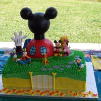 Justin's Mickey Mouse Clubhouse! This was for my friend's son's first birthday! He loves Mickey Mouse Clubhouse. It is a half choc. and half vanilla cake with...