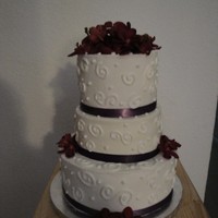 Wedding Cake This is actually only one tier of cake. The other two are dummy cakes because there were not many people at the reception. It is covered in...