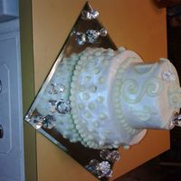 Dondra White cake, white butter cream...this cake survived a car accident...my attempt at elegant. The birthday girl loved it!