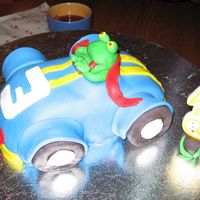 Frog Driving Racecar For my son's third birthday. He loves frogs and cars. I don't think he is going to let us eat it. "Mama, that frog is my...