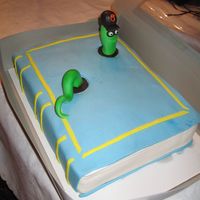 Bookworm Birthday Cake One of the volunteers at the library where I work turned 80 on Monday. I used a Debbie Brown design and added the Orioles hat because the...