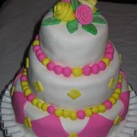 Bright Birthday Cake vanilla cake with hazelnut/chocolate buttercream filling, drizzled with Frangelico for extra "flavor"