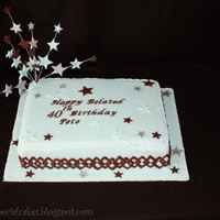 Blue And Chocolate Themed Cake A birthday cake for a friend who wanted a simple design with blue icing and very chocolaty!