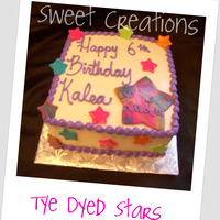 Stars 8in Square Cookies & Cream cake. Fondant stars bold colors and tye dye