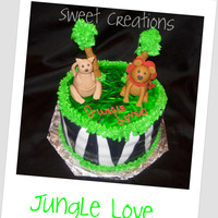 Jungle Love 8in Marble Cake covered in Vanilla white fondant. The stripe are arrow cut black fondant. Roo & Lion are fondant, dowels covered in...