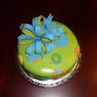 Gab's B-Day Cake from Cake Art for step-daughter's b-day. Used MMF for cake and pre-made for bow. There was a big difference in workability for me...