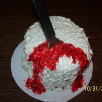 Bloody Brain Red velvet with cream cheese brain matter. I tried to carve it somewhat, but I didn't want to go too skinny on the bottom like the...