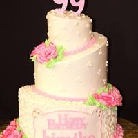 99Th Birthday Cake My first topsy turvy cake. 10", 7" and 3" of french vanilla WASC with whipped cream and strawberry filling, iced with...