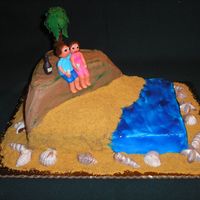 Maui Engagement Cake for engagement party. Proposal happened on mountain in Maui at sunset with a bottle of champagne. Buttercream with fondant figures,...
