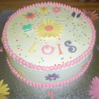 Lois's First cake for my brother's daughter's first birthday ... left it till late this evening so rushed through it ... not very happy with...