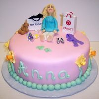 Fondant Figure This was for a mom of 2 who loves to go shopping at target! Everything is edible. Thank you AINE2