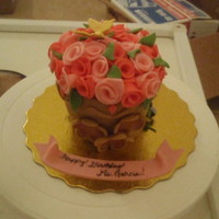 Pot Flower Birthday Cake This was made for one of my son's teacher's. Covered in fondant and ribbon roses.