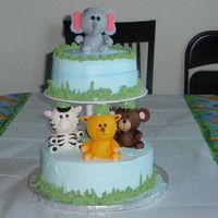 Jungle Theme Birthday Cake This idea was taken from Wilton. I did it fir my younger son's first bday.