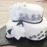 Black/white Made this for a friend's wedding. The flowers are silk.