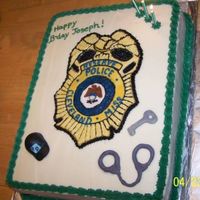 Police Badge Cake B-day cake for a man who is in the police reserves. It's a Strawberry Sour Cream cake, brushed with strawberry simple syrup, frosted...