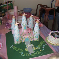 Princess Castle Cake Castle cake for 1st bday. Turrets are Styrofoam covered in fondant. Vanilla cake with vanilla pudding filling. 500 purple circles for the...