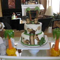 Lambs And Cocoa Shower Cake Based off of bedding that the mom picked. Looked much better in person! All of the animals were dusted with gold luster dust to match...