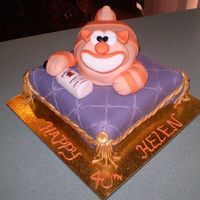 Malibu Drinkin' Cheshire Cat Chocolate cake on the bottom. Cat is a Malibu Rum cake with rum icing . Made it for a friend who loves Malibu Rum and cats.