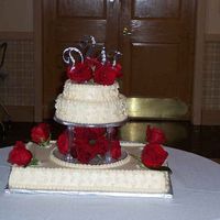 Teri.jpg 1/2 sheet with 8 & 6" stacked - the flowers are real.