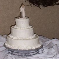 Jeff & Julia Buttercream with royal roses.