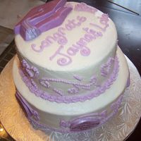 Graduation Cake stacked graduation cake, buttercream with fondant accents.