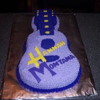 Hannah Montana Cake This cake I did for a friend's little girl who was turning 5. Most of it is buttercream and just the letters and stars are fondant.