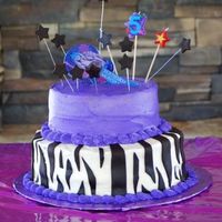 Hannah Montana This was for my daughter's 5th Bday. Cake is yellow w/ buttercream. Zebra stripes are chocolate fondant. Thanks for the ideas from...