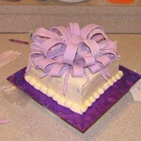 Mom's B-Day Cake This is carrott cake with buttercream icing. The bow is candy mold.