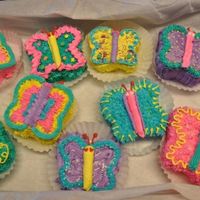 Small Butterfly Cakes This is WASC, cut into butterfly shapes, and decorated with Indydebi's buttercream