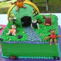 Fruit Fairies My version of Debbie Brown's Fruit Fairy cake - made with Macsmom's Rainbowlicious cake, Indydebi's BC, and fondant figures...