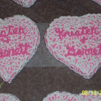 Heart Cookies Cookies made for a wedding shower. Iced in Pink with White lace, and pink bride and grooms name.