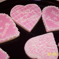 Cookies try'n to get a wedding...she wanted to taste the cookies and she wanted to see what they would look like she loved them.