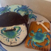 Blue Crabs On The Run this is a side picture of it, the pot lid was a card board circle covered in fondant.