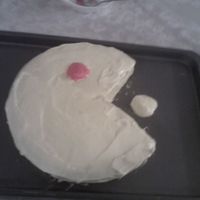 Pac Man My 15 yr old son's first cake to decorate.