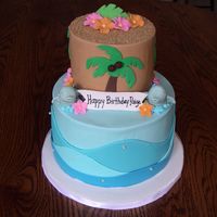 Ocean/beach Birthday 8" and 5" rounds iced in buttercream with fondant accents/gumpaste flowers