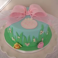 Spring Birthday 6" round covered in fondant with fondant decorations/gumpaste bow. Thanks to jacqueline538 and Liis for inspiration!