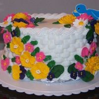 Flower Basket basket weave cake with royal icing flowers.