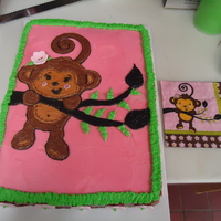 Monkey Cake Everything is buttercream except for the flowers, which are fondant.