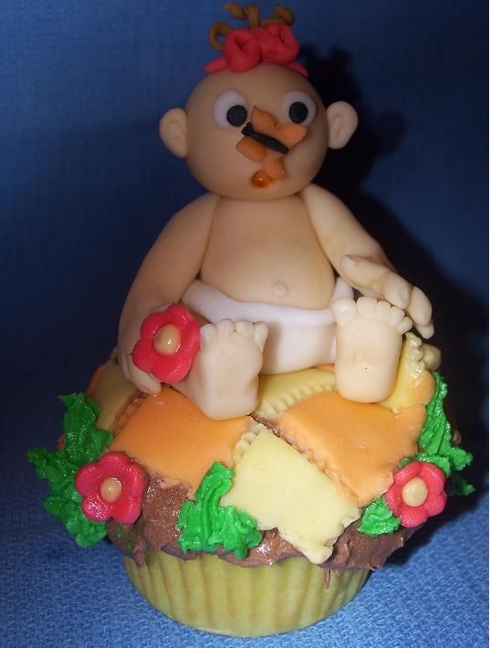 Butterfly Baby She is my first attempt at sculpting fondant. (Did have all of her toes before my 3yr old 'helped' me). I entered her in the...