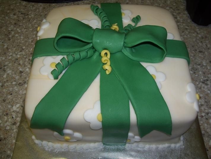 Present First time covering a cake with fondant, did this for my Wilton course 3 class.