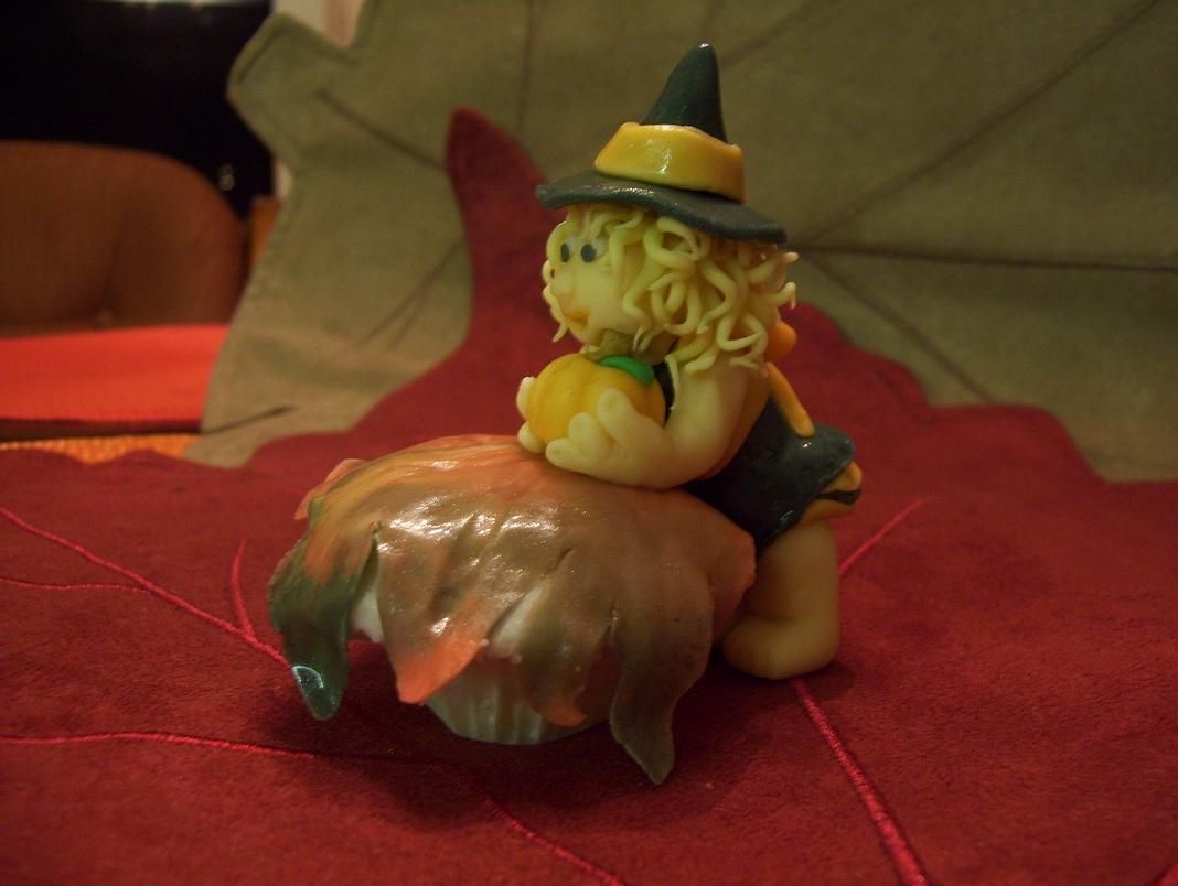 Baby Witch I entered this cupcake in the cutest cupcake contest for women's day magazine. She is my second attempt at sculpting fondant. Baby...