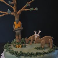 Hunting Cake for my husband's 40th, a cake of him asleep in his stand