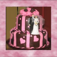 Stacked Mmf Second time working with MMF. I used Rhonda's recipe for both the white and colored fondant. Hated to put the cheesy bride and groom...