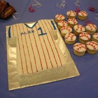 Baseball Jersey This cake was for a shower that I had for a friend that was adopting a 2 year old boy. I could not find the Wilton jersey pan so I had to...