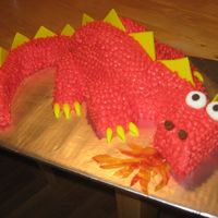 Fiery Dragon Cake not an original design, but I had a lot of fun making this cake - it had wings (made from fruit rollups) but they didn't make it into...