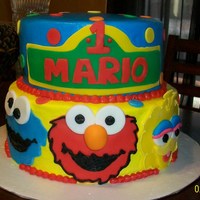 Elmo And Friends 10" chocolate and 8" vanilla covered in butter cream with fondant accents. Inspired by cakes here on CC. Made a 6" smash...