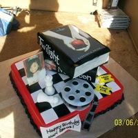Twilight/hollywood Movie The little girl I made this for wanted a Twilight/Hollywood movie themed cake. This cake was done with a 12"x2" pan for the...